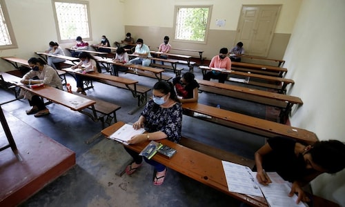 India to hold national college tests despite surging virus infections