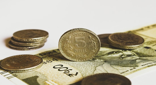 Rupee settles flat at 73.59 against US dollar