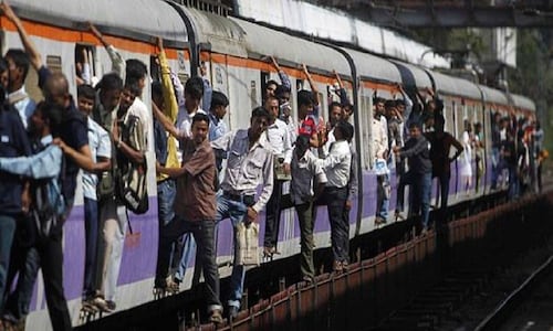 Railway minister travels in Mumbai local train, tastes 'vada pav' outside station