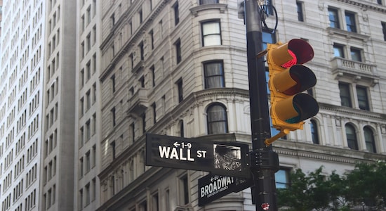Wall Street slumps on rising virus cases, fading stimulus hopes