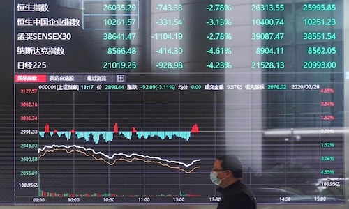 Asian stocks fall as virus spread accelerates