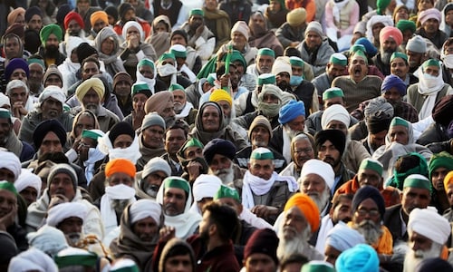 Undeterred by cold weather, rains, protesting farmers threaten to intensify stir further