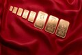 Gold edges up from six-week low as equities cool off