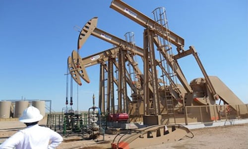 Oil falls below $100, eases pressure on oil companies