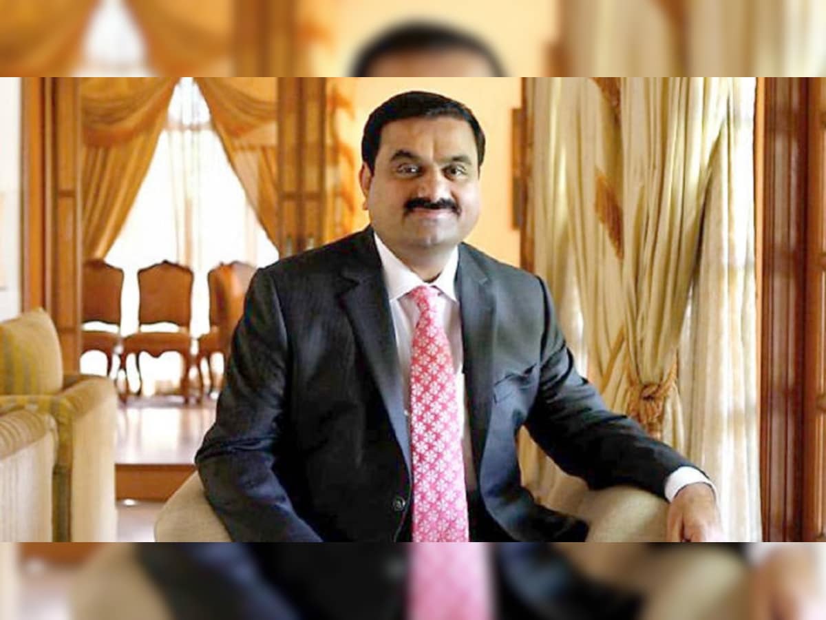 Indian Businessman Gautam Adani boards flight after getting off his BMW  7-Series