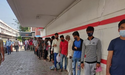 Mumbai lockdown: Scores of migrant workers flee city as fresh curbs kick in