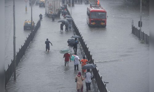 Heavy rains lash Mumbai; train, bus services hit due to water-logging ...