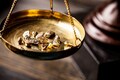 Gold prices to come down to $1600 per ounce by 2022-end: UBS strategist