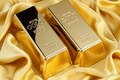 Gold prices edge higher on weaker yields, set for second weekly gain