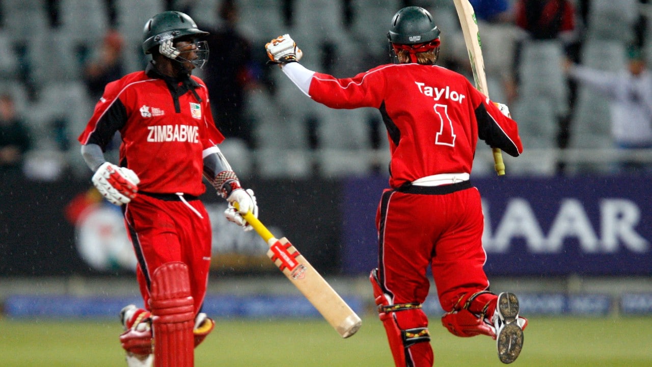 Zimbabwe's Elton Chigumbura and Brendan Taylor (R) celebrate after they defeated Australia in their ICC World Twenty20 cricket match in Cape Town September 12, 2007 (Image: Reuters)