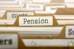 Why are govt employees threatening to go on strike over restoration of old pension scheme?