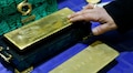 Gold prices fall on strong dollar, white metal falls over 2%