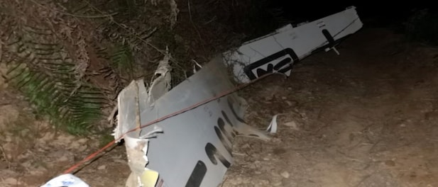 China plane crash: Rescue team recovers one of two black boxes