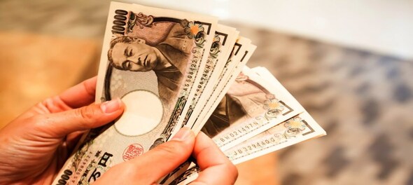 Yen remains under pressure, nears 24-year low