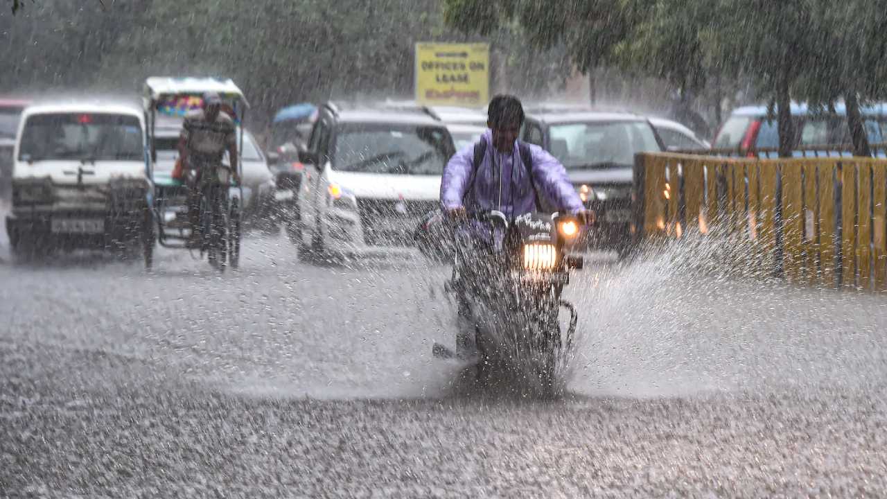 Vehicles wade through a waterlogged road amid monsoon rains, in Ghaziabad, Thursday, June 30, 2022.