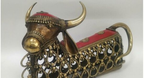 Nandi themed Dokra Art to Argentina’s President Dokra Art is non–ferrous metal casting art using the lost-wax casting technique. This sort of metal casting has been used in India for over 4,000 years and is still used. There are two main processes of lost wax casting: solid casting and hollow casting. The product of artisans who are mainly from the Central and Eastern India, are in great demand in domestic and foreign markets because of primitive simplicity, enchanting folk motifs and forceful form. This particular art-piece from Chattisgarh, a state in Central India, is a figure of ‘Nandi – The Meditative Bull’. According to Hindu mythology Nandi is considered as the vehicle (mount) of Lord Shiva, the lord of destruction. In front of every Shiva temple, on the court facing the shrine, you can see the image of a Nandi. Nandi themed Dokra Art to Argentina’s President Dokra Art is non–ferrous metal casting art using the lost-wax casting technique. This sort of metal casting has been used in India for over 4,000 years and is still used. There are two main processes of lost wax casting: solid casting and hollow casting. The product of artisans who are mainly from the Central and Eastern India, are in great demand in domestic and foreign markets because of primitive simplicity, enchanting folk motifs and forceful form. This particular art-piece from Chattisgarh, a state in Central India, is a figure of ‘Nandi – The Meditative Bull’. According to Hindu mythology Nandi is considered as the vehicle (mount) of Lord Shiva, the lord of destruction. In front of every Shiva temple, on the court facing the shrine, you can see the image of a Nandi.