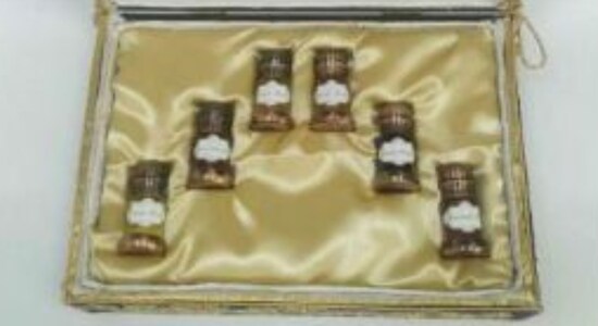 PM gifted Itr bottles in zardozi box to France’s President The carrier box has been crafted in Lucknow, the capital city of Uttar Pradesh, India. The Zari Zardozi box has been hand embroidered on khadi silk & satin tissue in colours of the French National Flag. The motifs are traditional Indo-Persian, lotus flowers hand embroidered with metal wire in blue and a pendant used in Kashmiri carpets and motifs from Awadhi architecture. This box includes: Attar Mitti- A unique attar produced in Kannauj, India where Petrichor- the fresh odour of first rain coming on earth is captured over sandalwood oil. It has an earthy wet natural aroma, produced by 5000-year-old traditional deg and bhapka method by distilling especially selected baked soil over Sandalwood oil. Jasmine Oil: An exclusive natural oil produce of freshly plucked flowers of Bela (Jasmine sambac) produced by careful hydro distillation to capture the unique most close to natural fresh floral sweet green odour of freshly plucked flower of Bela. Attar Shamama: An unique attar capturing the essence of a number of herbs & spices of age old vedic formulation over Sandalwood oil to produce an attar having warm spicy, herbaceous, oriental notes which is very difficult to replicate. Attar Gulab: An attar having odour most close to natural rose petal produced by hydro distillation in a copper vessel so as to avoid overheating of the petals. Exotic Musk: A modern masculine fragrance crafted with opulence of Jasmine, extravagant sensuality of Rose and the provocative charm of warm, woody note of Musk as its base note. Garam Masala: To celebrate the French appreciation for a strongly grounded cuisine, the newly formulated liquid Garam Masala has been added. It is an edible natural oil combination of extracts & essential oils of the Iconic Indian spice blend of Garam Masala, which is very difficult to replicate. PM gifted Itr bottles in zardozi box to France’s President The carrier box has been crafted in Lucknow, the capital city of Uttar Pradesh, India. The Zari Zardozi box has been hand embroidered on khadi silk & satin tissue in colours of the French National Flag. The motifs are traditional Indo-Persian, lotus flowers hand embroidered with metal wire in blue and a pendant used in Kashmiri carpets and motifs from Awadhi architecture. This box includes: Attar Mitti- A unique attar produced in Kannauj, India where Petrichor- the fresh odour of first rain coming on earth is captured over sandalwood oil. It has an earthy wet natural aroma, produced by 5000-year-old traditional deg and bhapka method by distilling especially selected baked soil over Sandalwood oil. Jasmine Oil: An exclusive natural oil produce of freshly plucked flowers of Bela (Jasmine sambac) produced by careful hydro distillation to capture the unique most close to natural fresh floral sweet green odour of freshly plucked flower of Bela. Attar Shamama: An unique attar capturing the essence of a number of herbs & spices of age old vedic formulation over Sandalwood oil to produce an attar having warm spicy, herbaceous, oriental notes which is very difficult to replicate. Attar Gulab: An attar having odour most close to natural rose petal produced by hydro distillation in a copper vessel so as to avoid overheating of the petals. Exotic Musk: A modern masculine fragrance crafted with opulence of Jasmine, extravagant sensuality of Rose and the provocative charm of warm, woody note of Musk as its base note. Garam Masala: To celebrate the French appreciation for a strongly grounded cuisine, the newly formulated liquid Garam Masala has been added. It is an edible natural oil combination of extracts & essential oils of the Iconic Indian spice blend of Garam Masala, which is very difficult to replicate.
