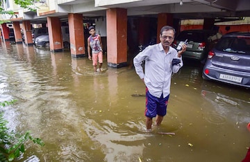 Guwahati: A flooded parking lot after heavy rains at Rukminigaon in Guwahati, Wednesday, June 15, 2022. 