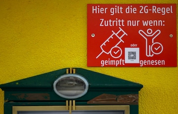 A sign shows the requirements to enter restaurants and bars as the spread of the coronavirus disease (Covid-19) continues in Frankfurt, Germany. (Reuters)