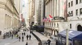 Wall Street edges higher, dollar falls on easing inflation