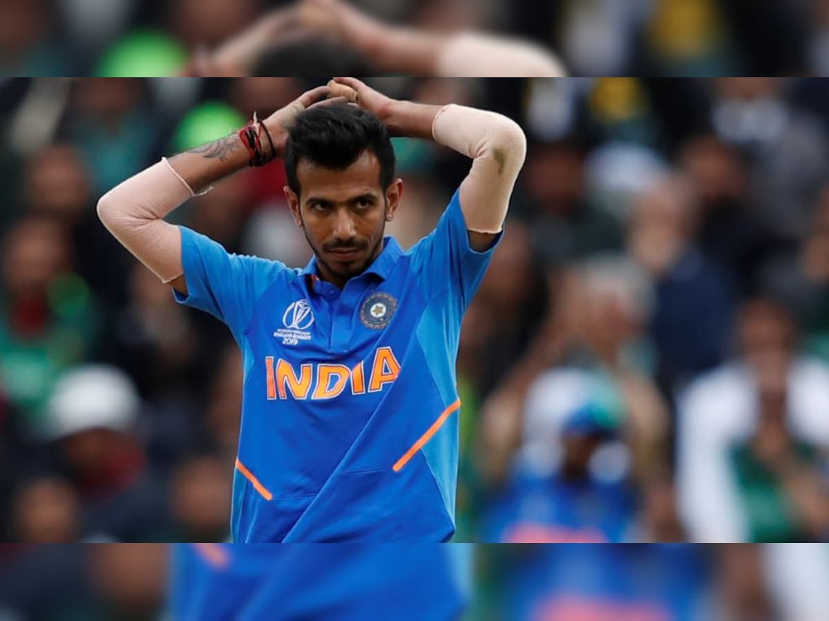Cricket Universe - Yuzi Chahal clicked with the ABD's autographed