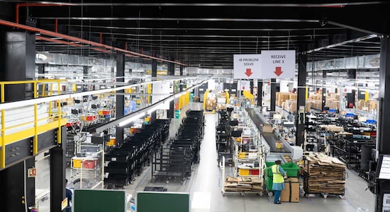 CNBC-TV18 travelled to Amazon&#039;s biggest fullfilment centre in India in Bengaluru to witness the behind the scenes.