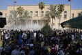 Protesters storm Baghdad presidential palace as Iraqi Shiite cleric quits politics, 15 dead