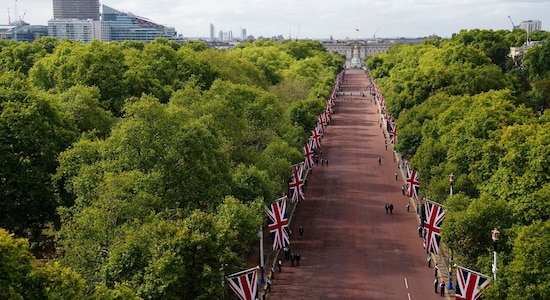 CNBCTV18 Royal procession from Buckingham Palace to Westminster Hall, crowds gather to pay their respects