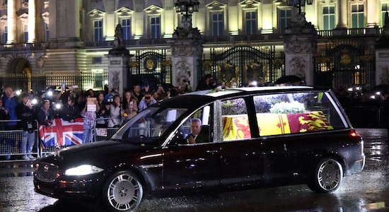 Royal procession from Buckingham Palace to Westminster Hall, crowds gather to pay their respects