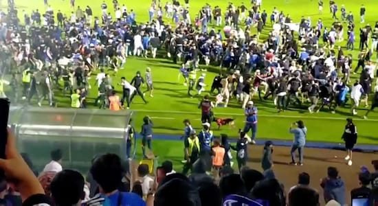 At least 125 people have been reported to have died due to the violent clash at the Kanjuruhan Stadium in Indonesia during a football match into the early hours of Sunday. The chaos and violence erupted between the supporters of Arema FC and rival Persebaya Surabaya, two of Indonesia’s biggest football teams. The Indonesia football stadium crush is being reported as one of the world’s deadliest stadium disasters of all time. Here is a look at some of the other disasters that happened in a football stadium. (Image: Reuters)