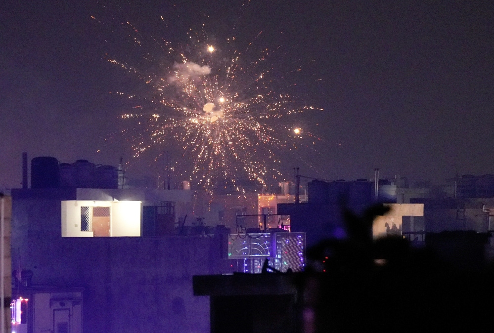 Firecrackers being burst to celebrate Diwali festival, flouting the ban imposed on it by the Delhi Government, in New Delhi, Monday (Image: PTI)