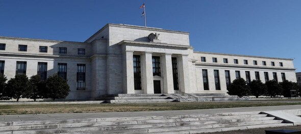 US Fed keeps rates unchanged, but signals likelihood of another hike this year
