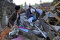 Indonesia struggles to get aid to earthquake survivors, rescue continues