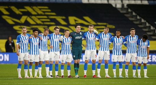  Championship - Huddersfield Town v Rotherham United - - December 29, 2022 Players during the Huddersfield Town v Rotherham United at John Smith's Stadium, Huddersfield, Britain hold a minutes silence in memory of Pele before the match. 