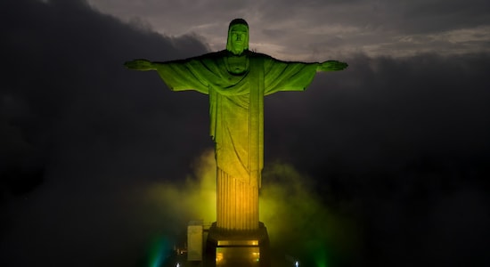 Christ the Redeemer statue is illuminated in the colors of the Brazilian national flag to honor late football legend Pele, in Rio de Janeiro, Brazil (Image: AP) Christ the Redeemer statue is illuminated in the colors of the Brazilian national flag to honor late football legend Pele, in Rio de Janeiro, Brazil (Image: AP)