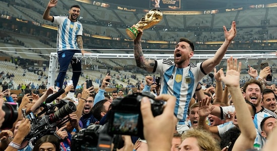 Lionel Messi with the World Cup trophy. (Image: AP)