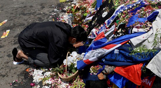 2. The Kanjuruhan Stadium disaster! | More than 130 people tragically lost their lives due to a riot and stampede that broke out at the Kanjuruhan Stadium in Malang Regency, East Java, Indonesia at the start of October. Around 180 people were injured during the match between arch-rivals Arema FC and Persebaya Surabaya. The stadium acts as a home ground for both teams but during the clash, the catastrophic events turned the derby into one of the world's worst stadium disasters. Weeks later, after quite a few protests, the government revealed that a significant of deaths were caused by "excessive" and "indiscriminate" use of tear gas. After that, a decision was made to demolish and rebuild the Kanjuruhan Stadium with President Joko Widodo vowed to thoroughly transform the sport for the football-crazy nation of Indonesia. (Image: Reuters) 2. The Kanjuruhan Stadium disaster! | More than 130 people tragically lost their lives due to a riot and stampede that broke out at the Kanjuruhan Stadium in Malang Regency, East Java, Indonesia at the start of October. Around 180 people were injured during the match between arch-rivals Arema FC and Persebaya Surabaya. The stadium acts as a home ground for both teams but during the clash, the catastrophic events turned the derby into one of the world's worst stadium disasters. Weeks later, after quite a few protests, the government revealed that a significant of deaths were caused by "excessive" and "indiscriminate" use of tear gas. After that, a decision was made to demolish and rebuild the Kanjuruhan Stadium with President Joko Widodo vowed to thoroughly transform the sport for the football-crazy nation of Indonesia. (Image: Reuters)