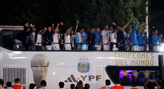 Argentina's World Cup winning players with the trophy after the team's arrival at Ezeiza International Airport in Argentina's World Cup winning players with the trophy after the team's arrival at Ezeiza International Airport in