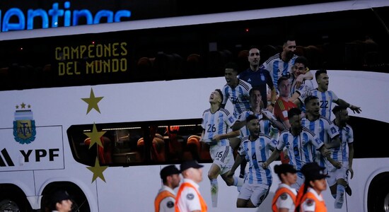 The open top bus that will carry the team throughout Buenos Aires awaits at the aiport. Notice the three stars painted on the bus signifying the team's three World Cup triumphs. (Image: Reuters) The open top bus that will carry the team throughout Buenos Aires awaits at the aiport. Notice the three stars painted on the bus signifying the team's three World Cup triumphs. (Image: Reuters)