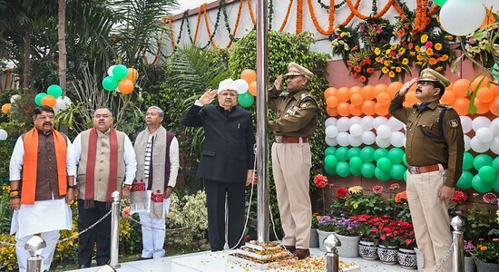 BJP National Vice President and former Chief Minister of Chhattisgarh Raman Singh unfurls the Tricolour at the BJP headquarters in New Delhi, Thursday, Jan. 26, 2023.