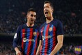 How has Barcelona's spending cap reduced after Champions League exit?