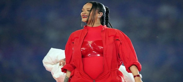 Rihanna shows off baby bump at smashing Super Bowl show; rep confirms singer is expecting 2nd child