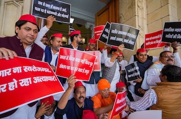 Lucknow: Samajwadi Party leaders stage a protest during the Budget Session of Uttar Pradesh Assembly, at Vidhan Bhawan in Lucknow, Monday, Feb. 20, 2023. (PTI Photo/Nand Kumar)(