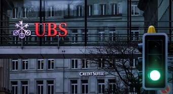 UBS drops as cautious wealth clients add to Credit Suisse takeover challenges