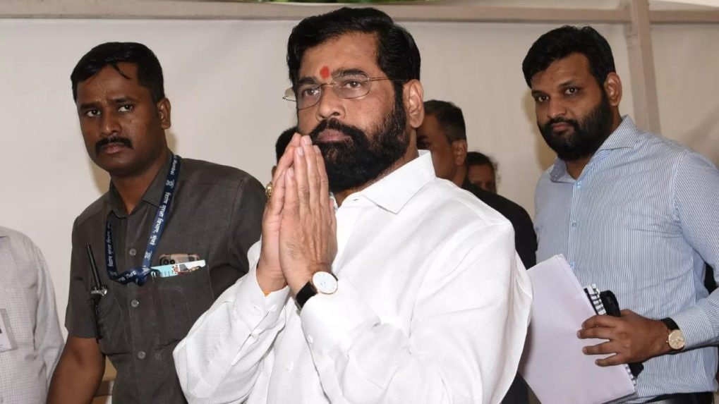 There's a sword hanging on Eknath Shinde and it's the speaker holding it