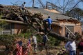 US storm: Collapsed roofs, splintered trees – tornadoes lead to mass destruction from Arkansas to Delaware