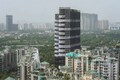 What drives Sanjeev Prasad's optimism for the real estate sector