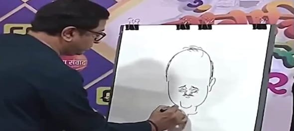 MNS chief Raj Thackeray draws a cartoon of NCP's Ajit Pawar