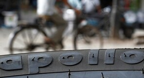 Apollo Tyres shares near record high after upgrades from JPMorgan, Nomura