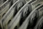 Dollar firms, yen skids as US Fed cut wagers crumble